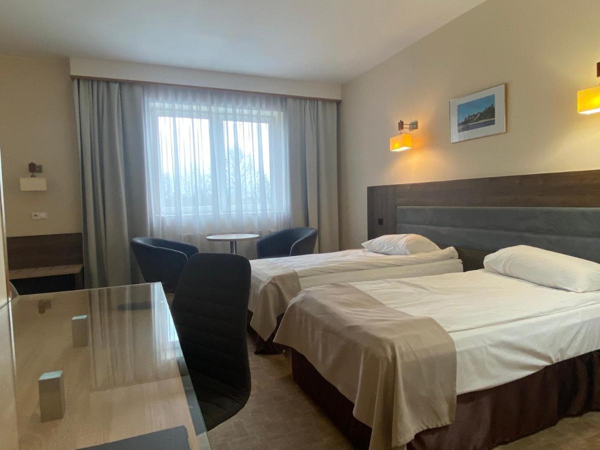 Hotel Ambasador Chojny Łódź Szoba fotó